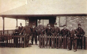 Pilots outside of Watch House (Photograph dated between 1895 and 1905)
